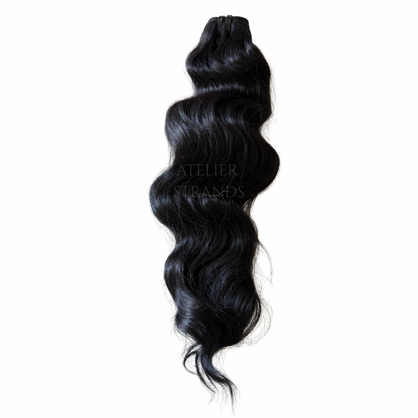 Cambodian natural wave hair extensions by Atelier Strands, full bodied with refined texture. 
