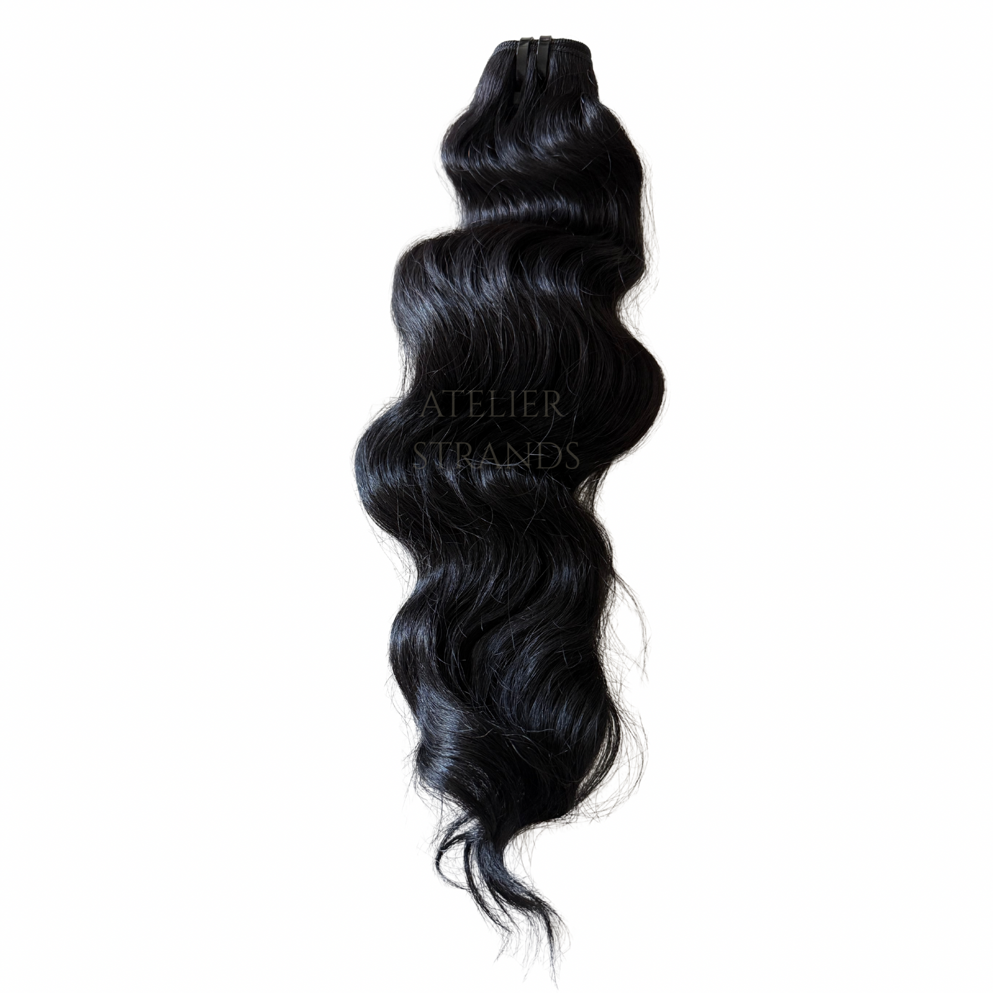 Cambodian natural wave hair extensions by Atelier Strands, full bodied with refined texture. 